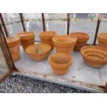 Collection of eighteen 20th C. terracotta plant pots.