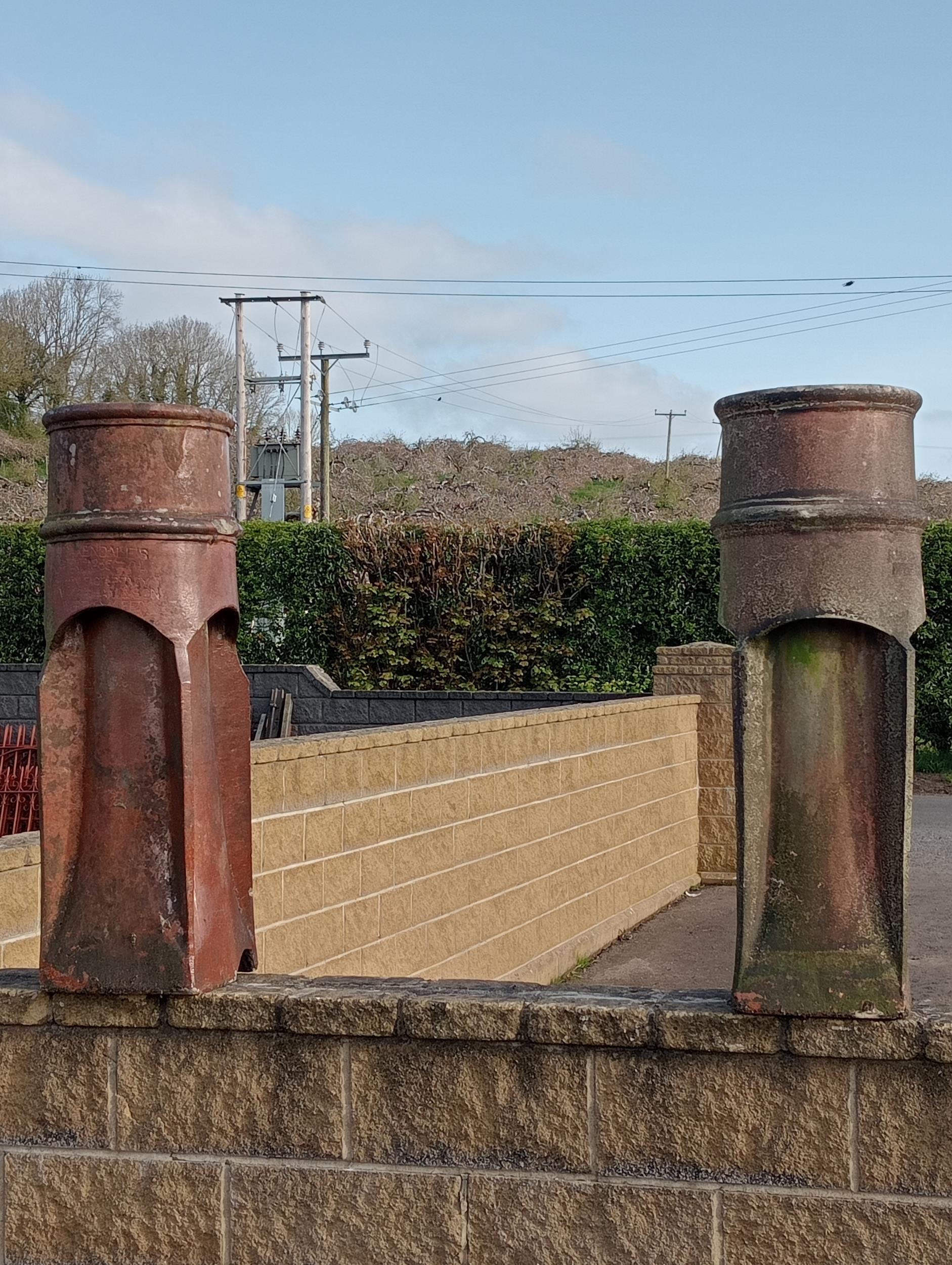 Pair of terracotta salt glazed chimney pots {H 106cm x W 28cm x D28cm }. (NOT AVAILABLE TO VIEW IN