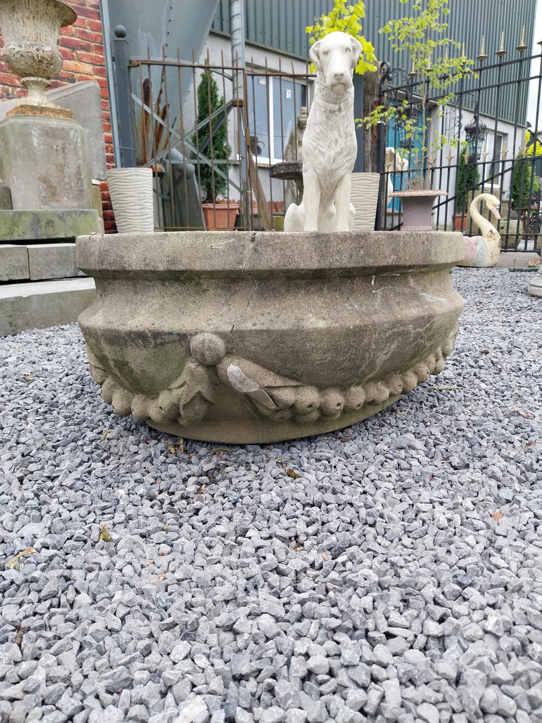 Good quality carved sandstone planter decorated with swags {37 cm H x 80 cm W x 61 cm D}. - Image 6 of 7