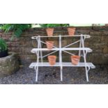 Good quality wrought iron three tier plant stand {75cm H x 116cm W x 60cm D}