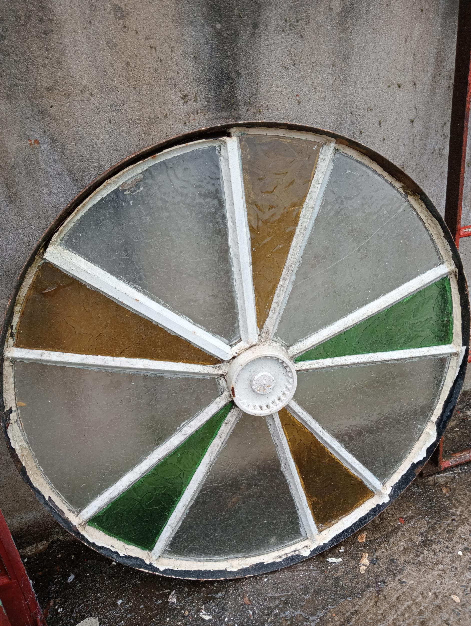 Iron wagon wheel window {Dia 112cm x D 7cm }. (NOT AVAILABLE TO VIEW IN PERSON)