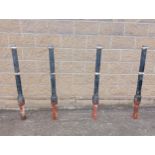 Four cast iron bollards {H 130cm x Dia 12cm }. (NOT AVAILABLE TO VIEW IN PERSON)