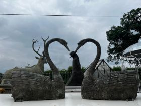 Pair of good quality bronze swan sculpturew in the form of water features {70cm H x 125cm W x 60cm