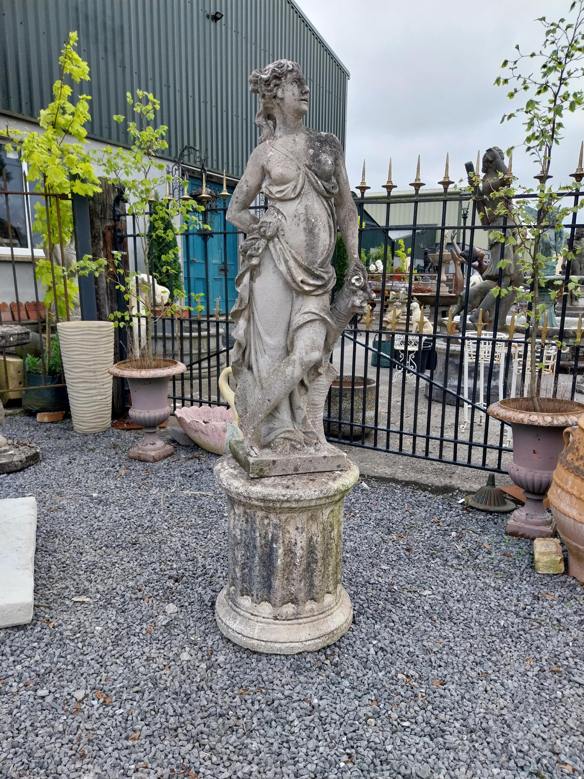 Early 20th C. moulded stone statue of a Grecian lady {117 cm H x 43 cm W x 27 cm D}.