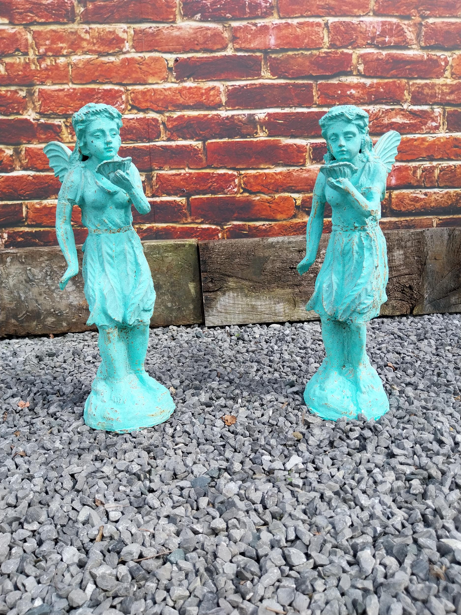 Pair of cast iron figures of Fairies {47 cm x 18 cm W x 31 cm D}.