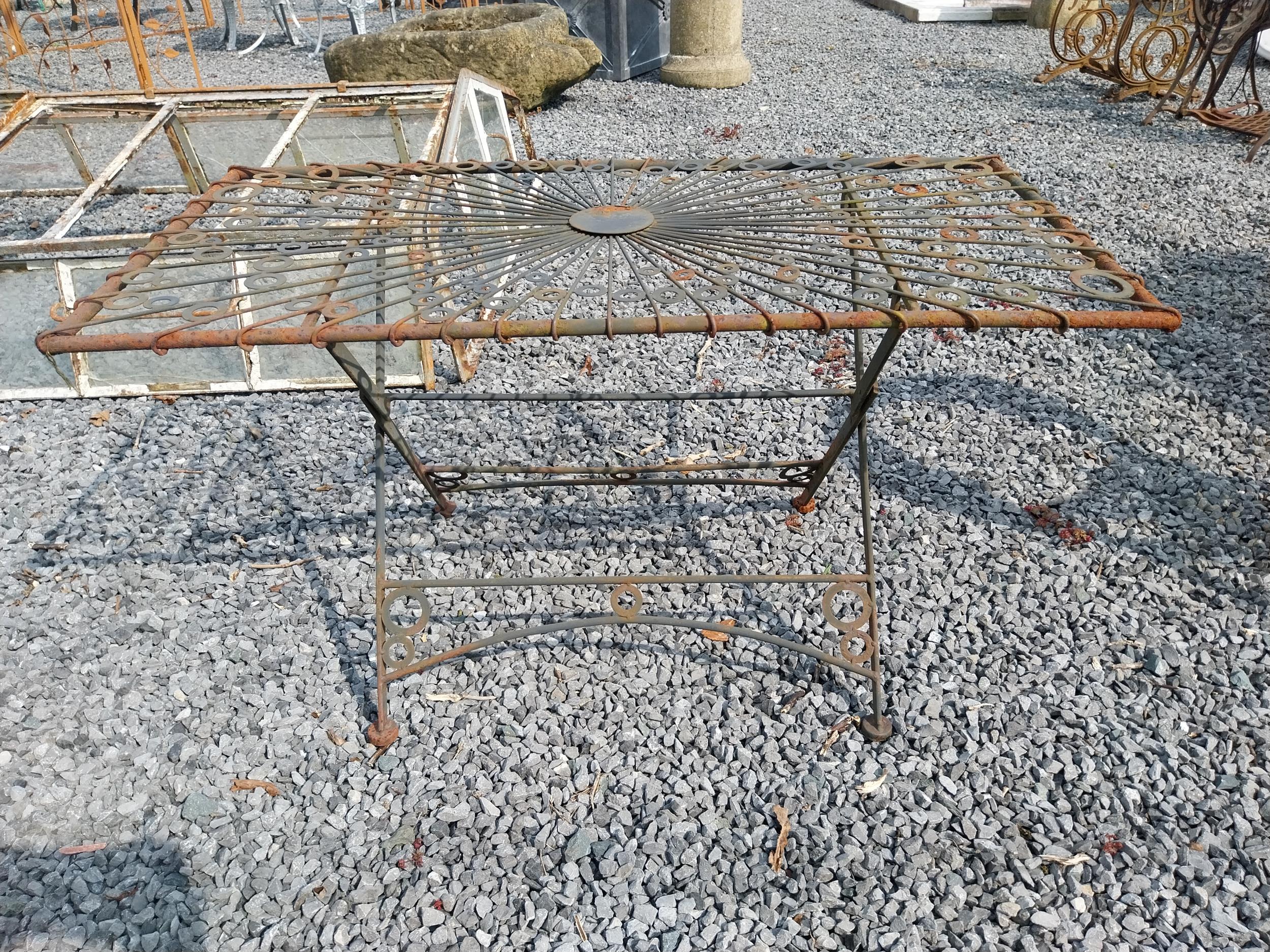 Metal wire coffee table {49 cm H x 90 cm W x 46 cm D}.