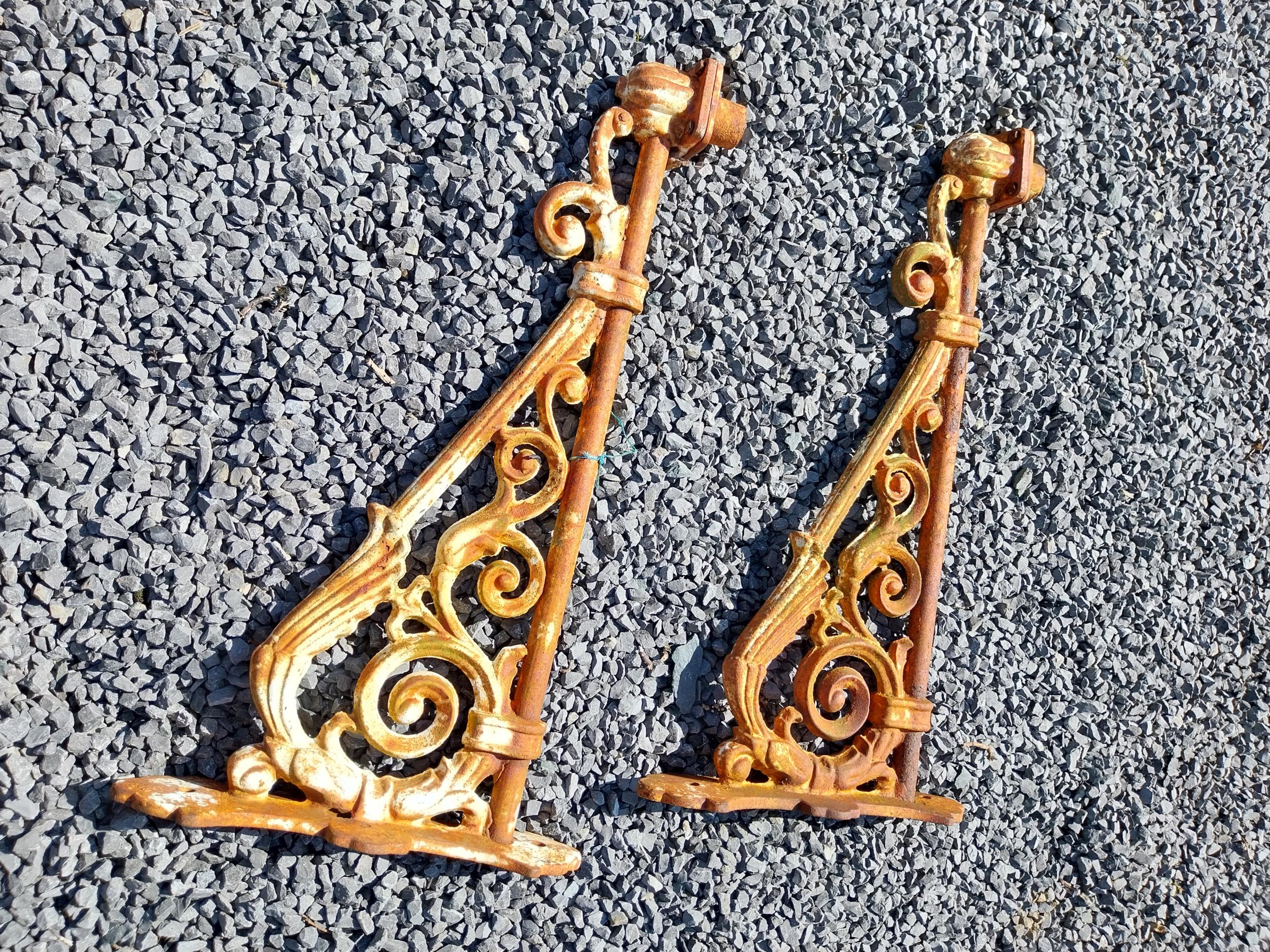 Pair of good quality decorative cast iron wall brackets {39 cm H x 72 cm W x 11 cm D}. - Image 2 of 5