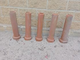 Collection of five terracotta pipes {H 68cm x Dia 18cm }. (NOT AVAILABLE TO VIEW IN PERSON)