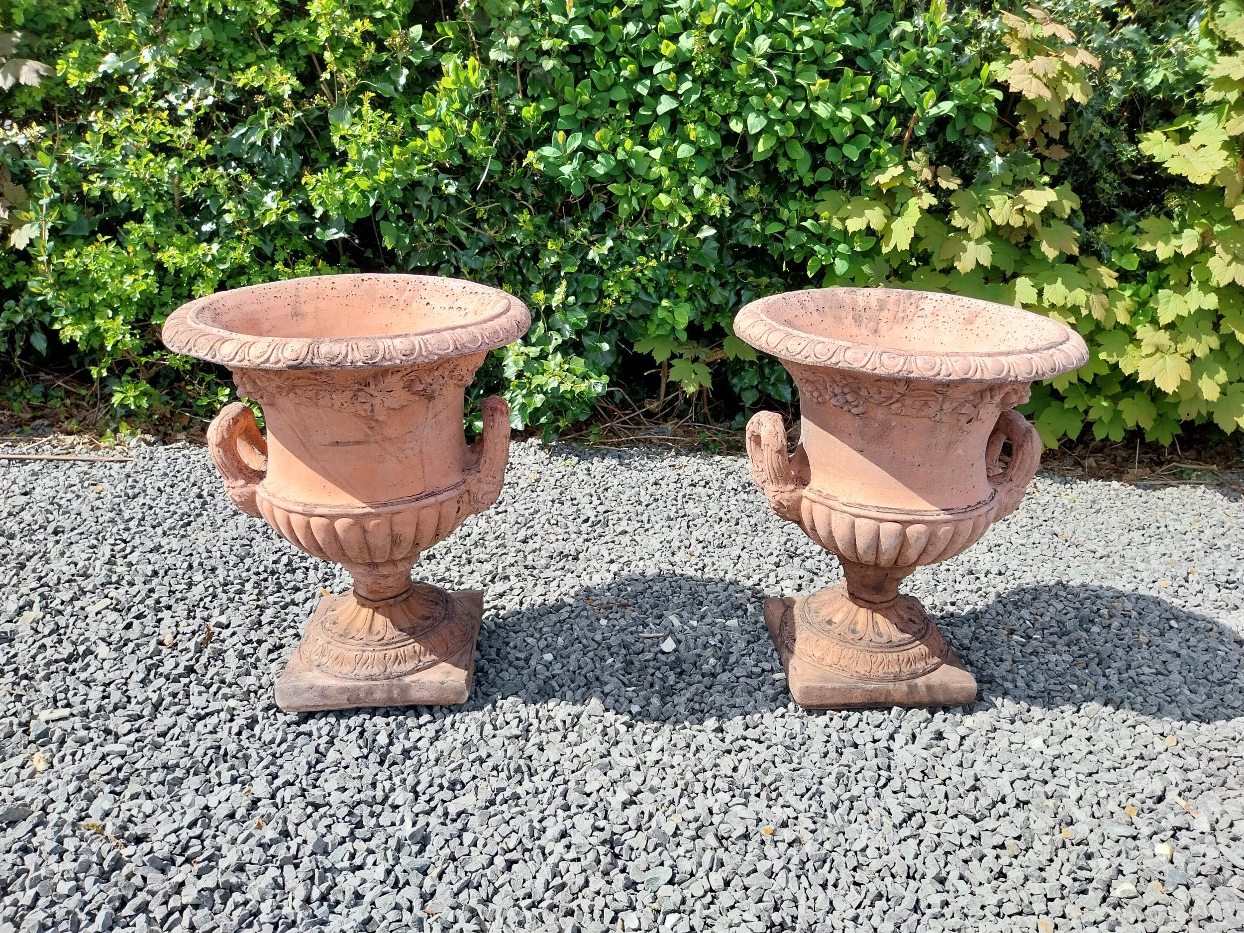 Pair of moulded terracotta lattice urns ivy leaf decoration {56 cm H x 46 cm Dia.}. - Image 2 of 8