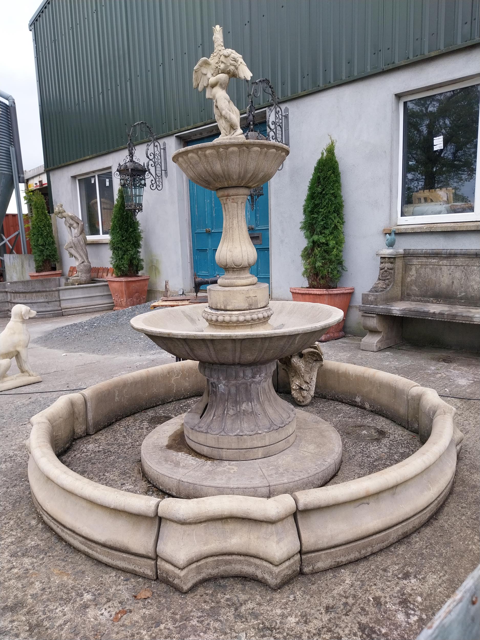 Good quality moulded sandstone two-tiered fountain surmounted by Cherub with surround {250 cm H x