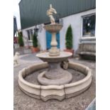 Good quality moulded sandstone two-tiered fountain surmounted by Cherub with surround {250 cm H x