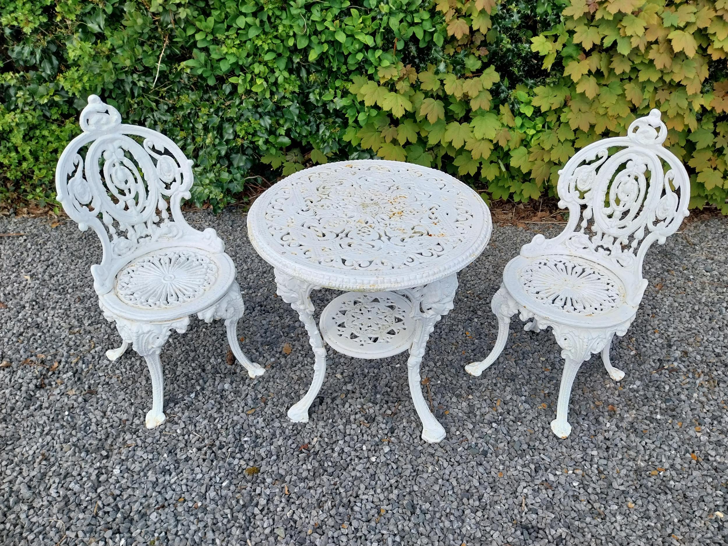 19th C. cast iron garden table with two matching chairs {Tbl. 68 cm H x 59 cm Dia. and Chairs 83 - Image 2 of 11