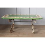 Handmade and hand painted ceramic table raised on cast iron scroll base {H 79cm x W 200cm x D