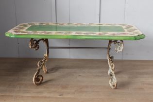 Handmade and hand painted ceramic table raised on cast iron scroll base {H 79cm x W 200cm x D