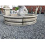 Moulded stone flower bed surround {39 cm H x 200 cm Dia.}.