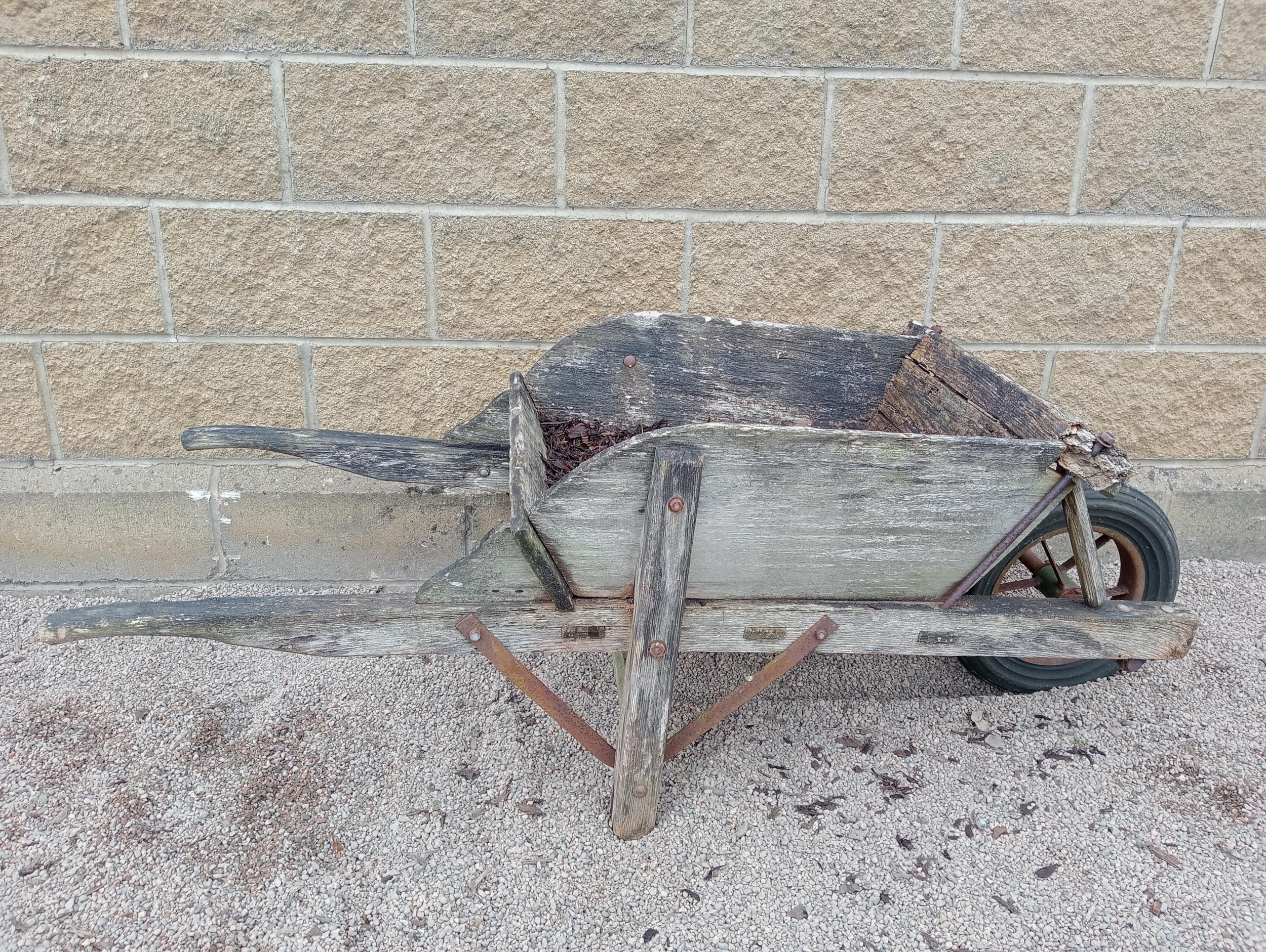 Wooden wheel barrow {}. (NOT AVAILABLE TO VIEW IN PERSON)