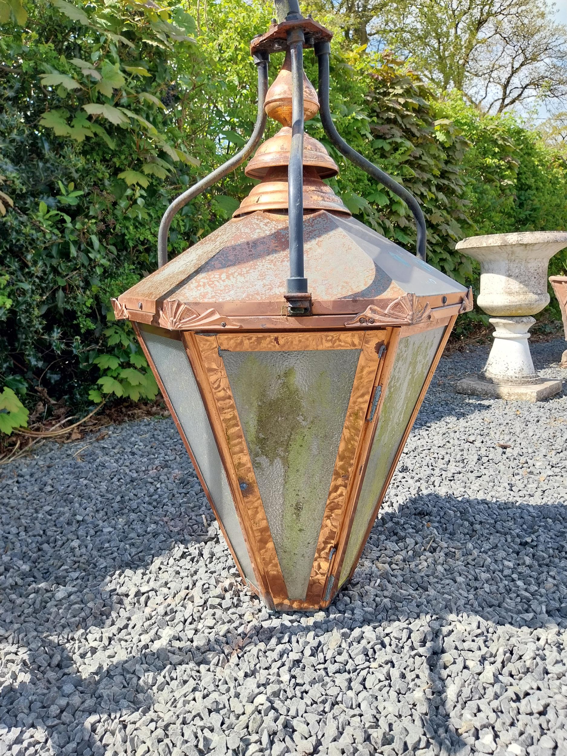 Good quality copper wall lantern with wrought iron bracket {129 cm H x 94 cm W x 54 cm D}. - Image 3 of 9