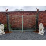 Pair of wrought iron entrance gates decorated with spire finials {195 cm H x 325 cm W}.