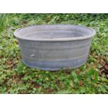 Galvanise metal oval garden planter with handles {31 cm H x 83 cm W x 52 cm D}.