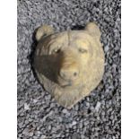 Moulded sandstone wall mounted Bear head plaque {33 cm H x 28 cm W x 26 cm D}.