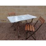 Cast iron table marble top with two folding metal and wooden bistro chairs {Table H 70cm x W 106cm x