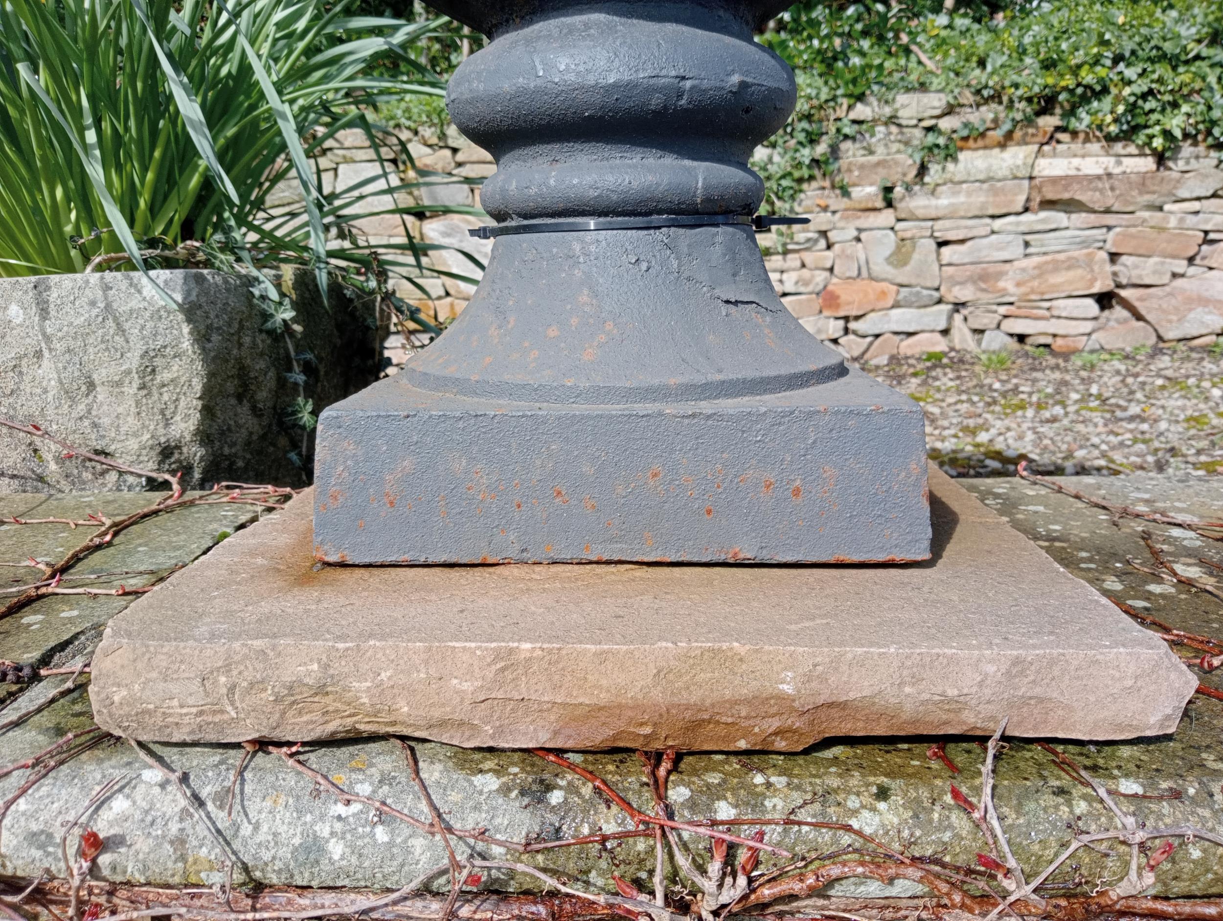 Pair of cast iron urns raised on sandstone pedestal {H 67cm x Dia 60cm }. (NOT AVAILABLE TO VIEW - Image 5 of 6