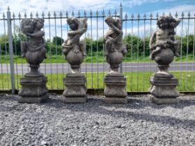 Set of four good quality moulded stone statues of Cherubs depicting the four seasons raised on