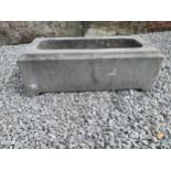 Limestone trough {24 cm H x 66 cm W x 27 cm D}.