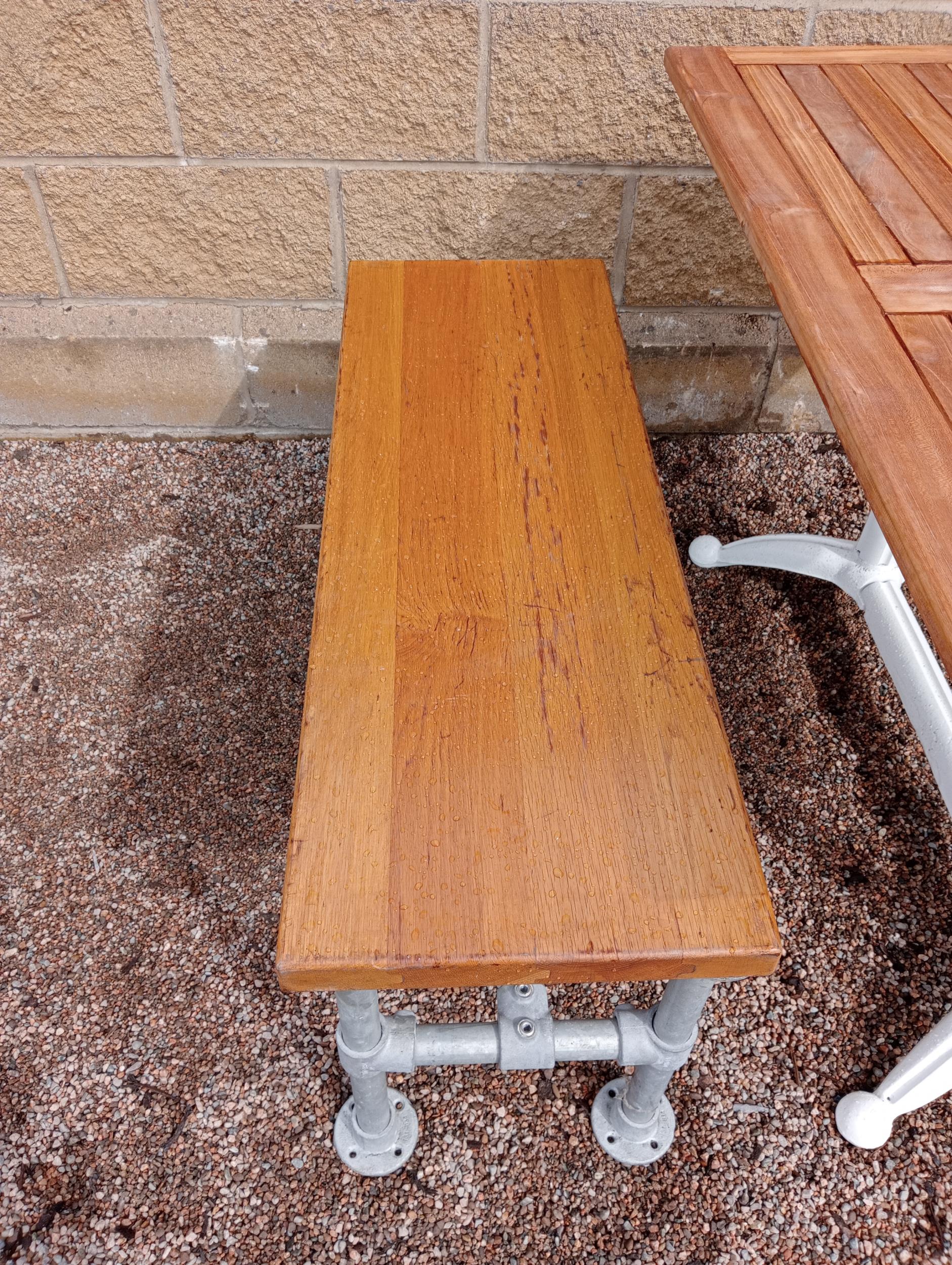 Cast iron garden table with Iroko wood top including wooden bench and two stools {Table H 73cm x W - Image 4 of 7