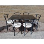 Cast iron table with marble top and six metal chairs with leather seats {Table H 72cm x W 120cm x