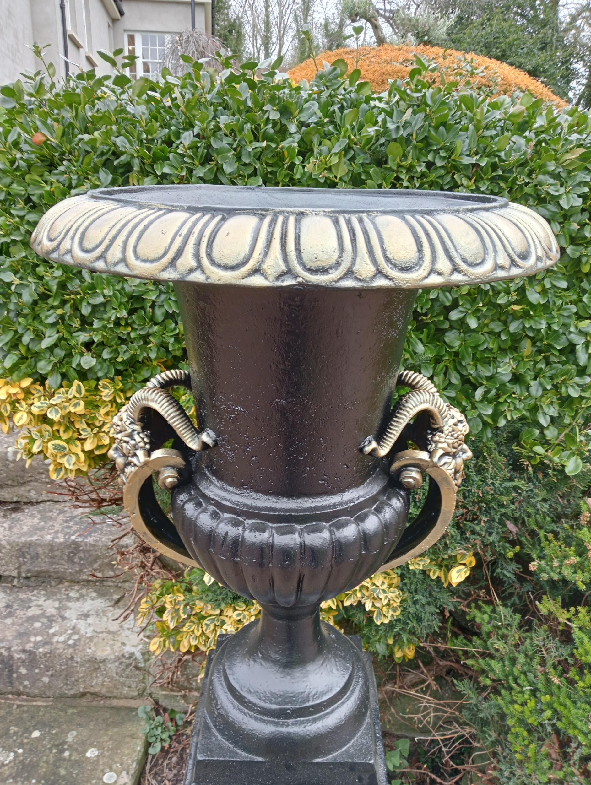 Pair of cast iron urns and bases {H. 185cm x Dia 66cm Base H 93cm x 53 x 53}. (NOT AVAILABLE TO VIEW - Image 2 of 6