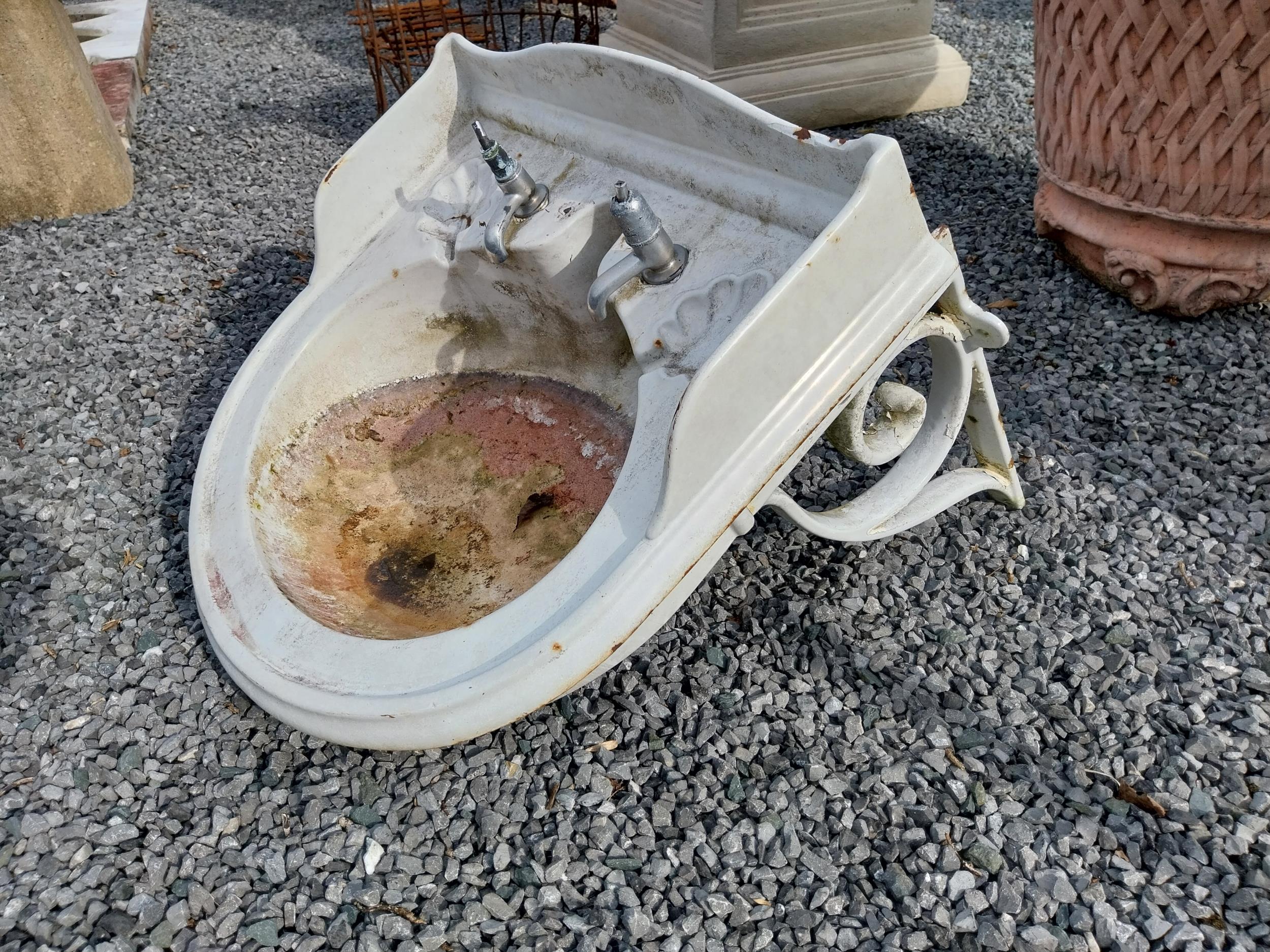 Early 20th C. enamel sink with original cast iron wall bracket {56 cm H x 65 cm W x 65 cm D}. - Image 2 of 2