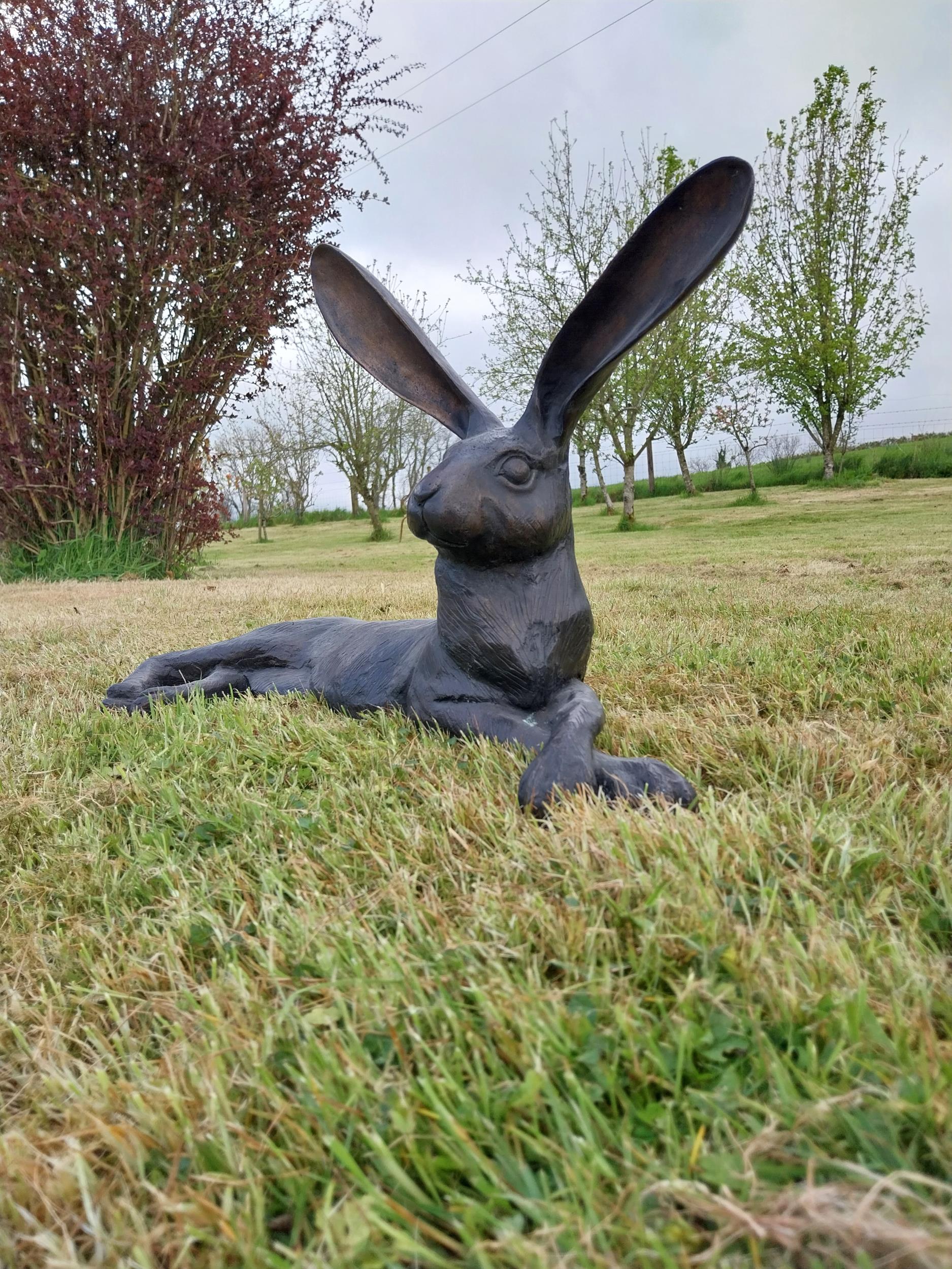 Exceptional quality bronze statue of a lying Hare with ears up {61 cm H x 35 cm W x 20 cm D}. - Image 3 of 5