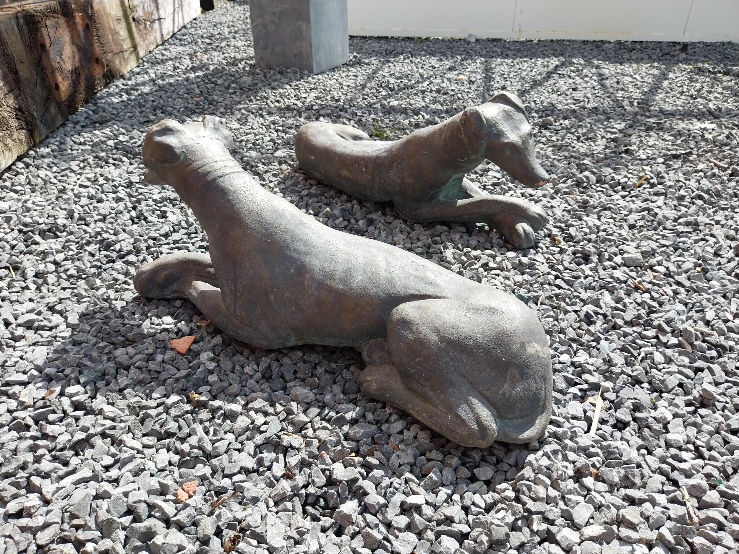 Pair of painted moulded terracotta statues of recumbent Whippets {24 cm H x 60 cm W x 19 cm D}. - Image 3 of 7