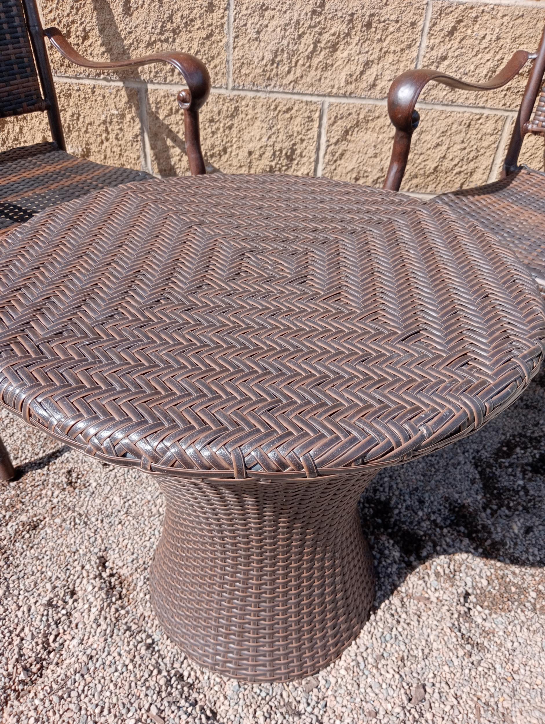 Rattan garden table and two chairs {Table H 56cm x Dia 60cm Chairs H 86cm x W 57cm x D 52cm }. ( - Image 2 of 4