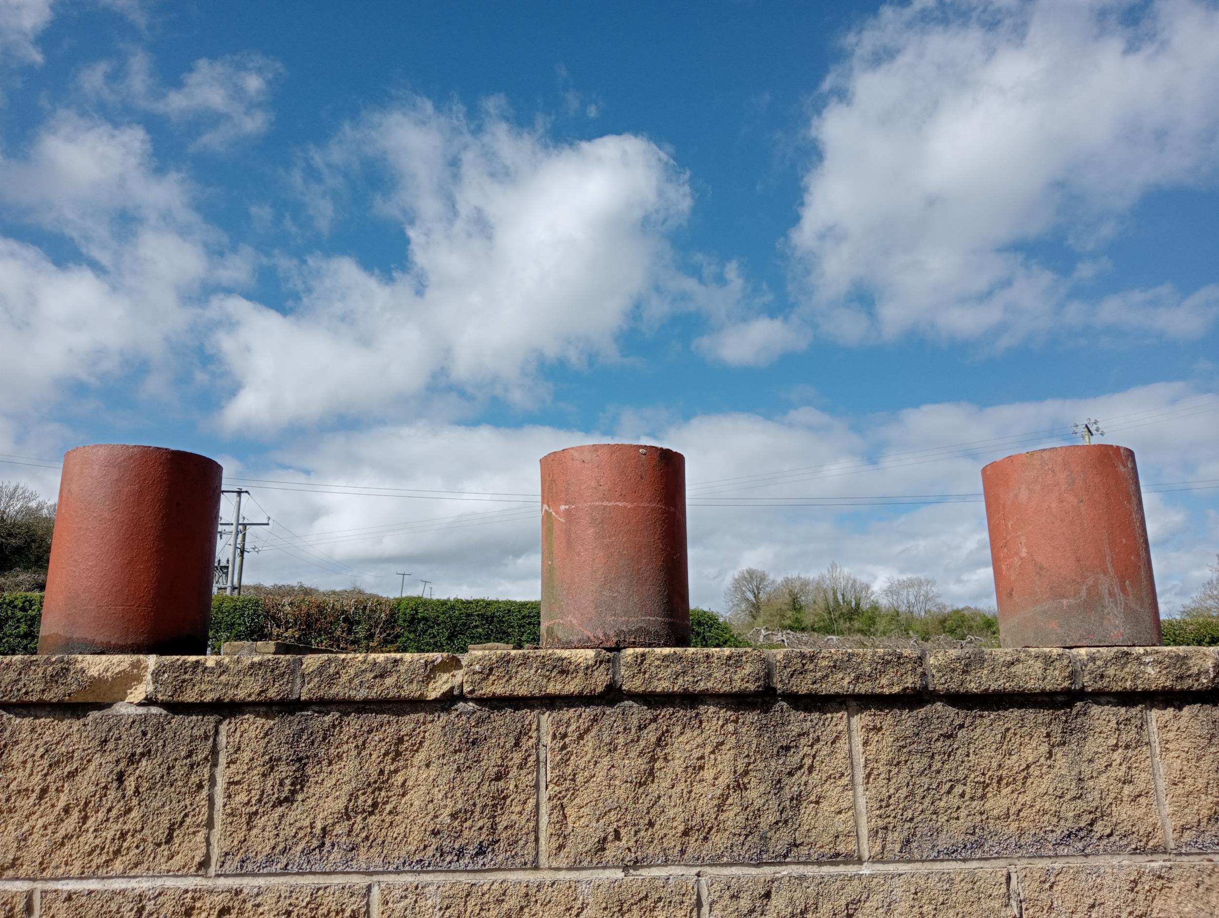 Set of three terracotta chimney pots {H 31cm x Dia 20cm }. (NOT AVAILABLE TO VIEW IN PERSON)