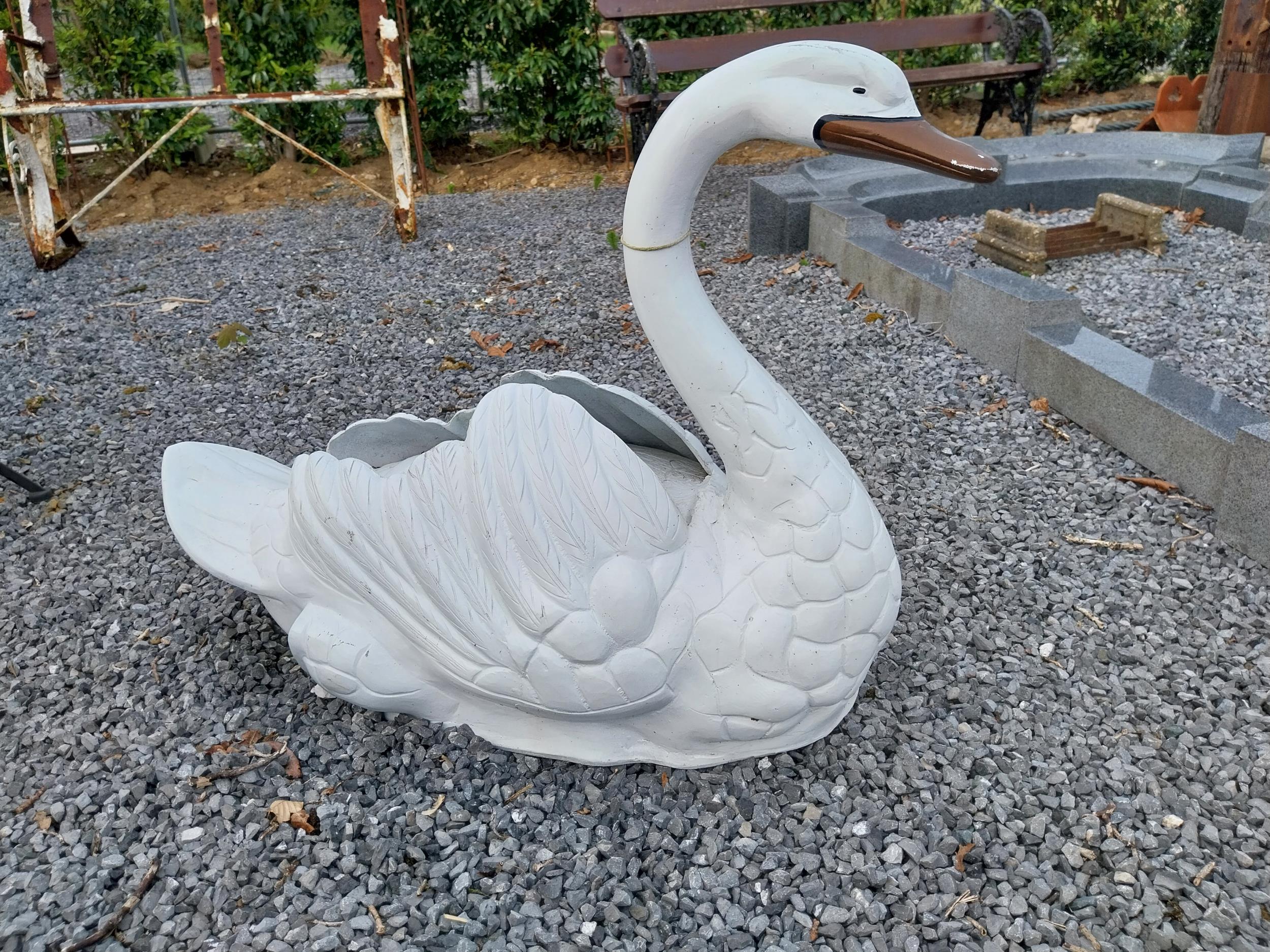 Good quality painted aluminium statue of a Swan {65 cm H x 94 cm W x 38 cm D}.