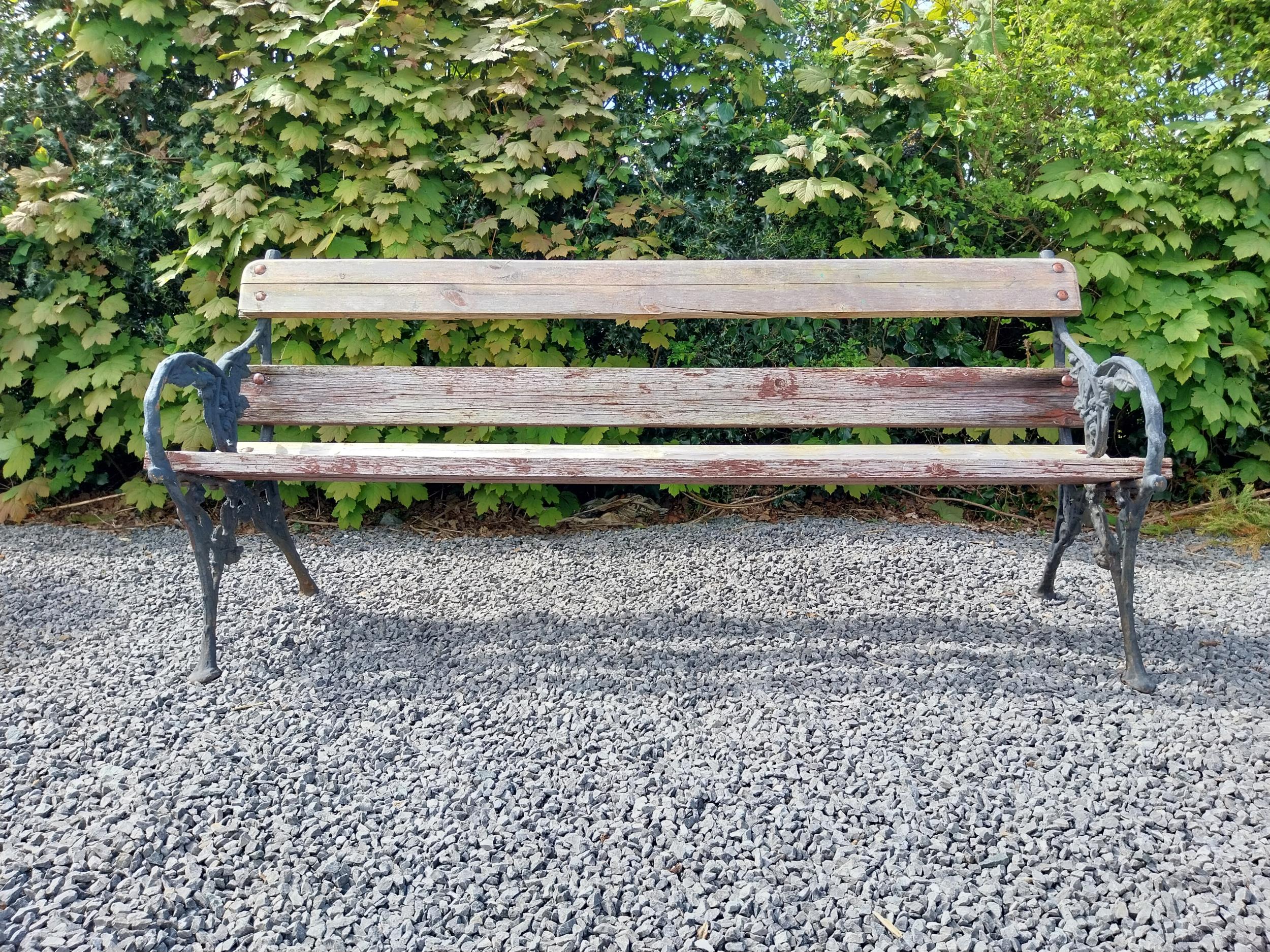 19th C. cast iron and wooden garden bench {80 cm H x 181 cm W x 56 cm D}.