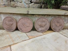 Collection of four composition stone coins depicting a farthing with wren bird {Dia 31cm x D