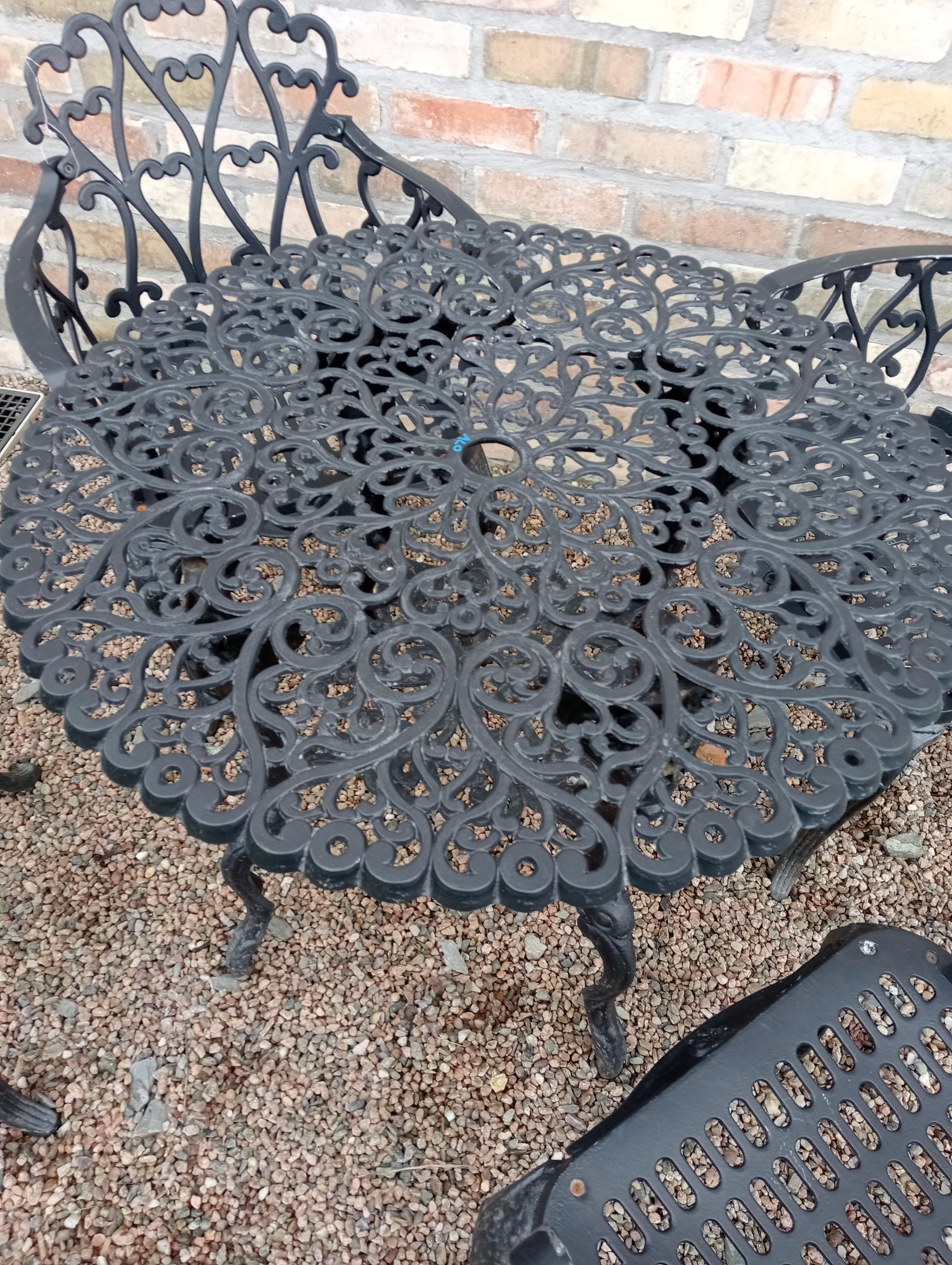 Cast aluminium black garden table four armchairs {Chairs H 80cm x W 58cm x D 50cm Table H 69cm x Dia - Image 2 of 5