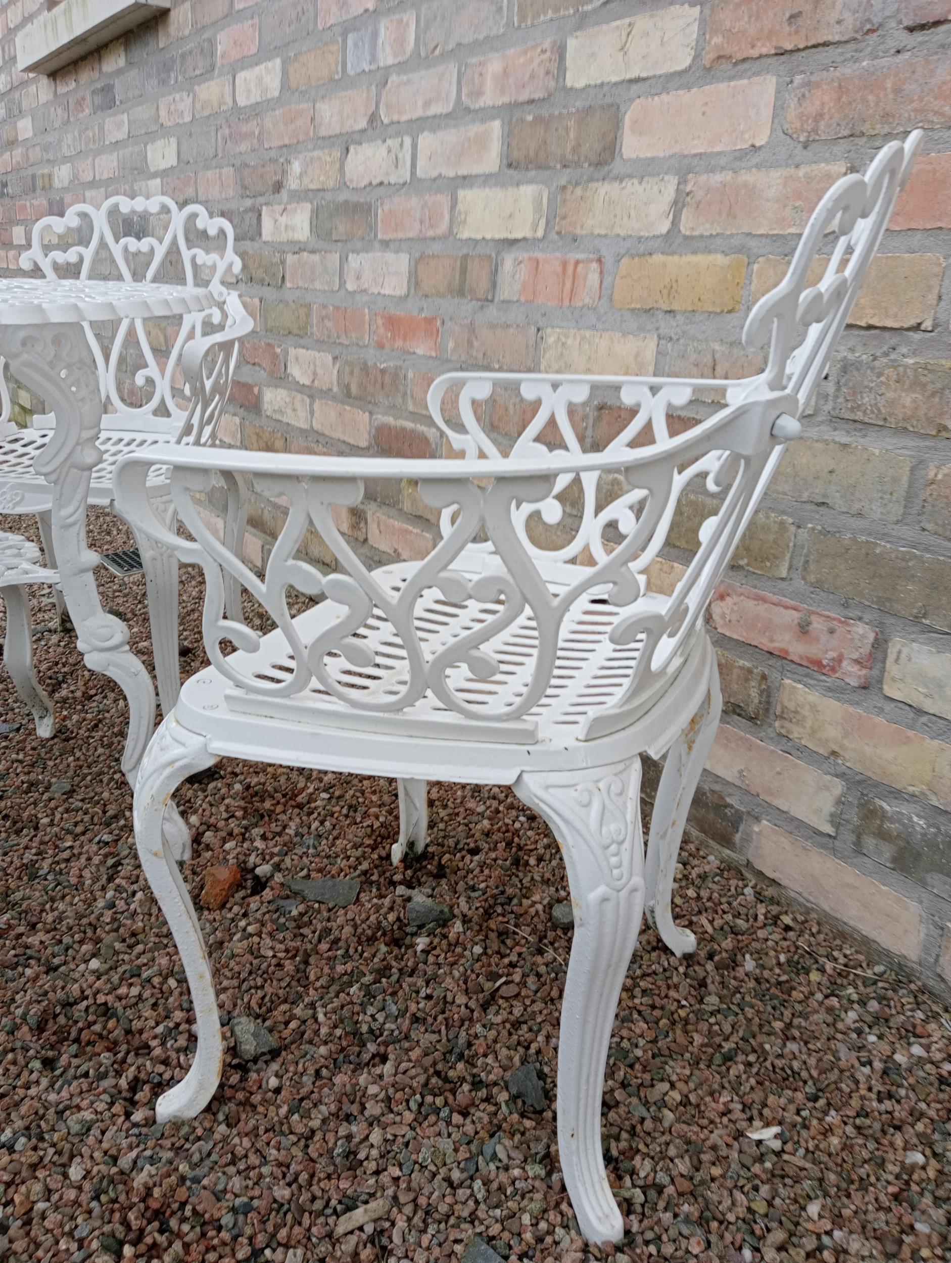 Cast aluminium white garden table four armchairs {Chairs H 80cm x W 58cm x D 50cm Table H 69cm x Dia - Image 4 of 6