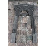 19th C. Kilkenny stone door frame with arched top enclosing an oval window {H 360cm x W 212cm x D