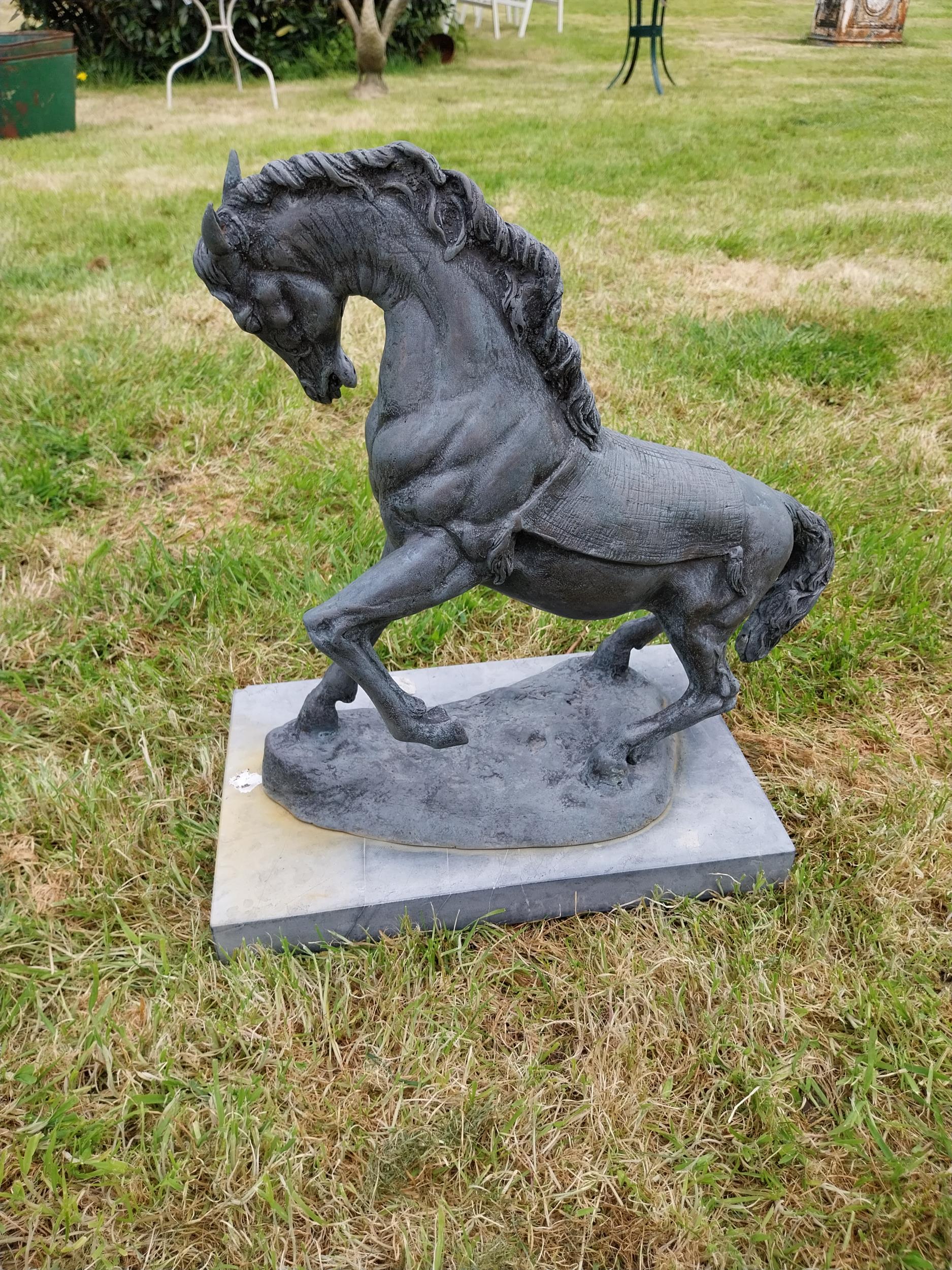 Bronze sculpture of a rearing Horse mounted on slate base {52 cm H x 41 cm W x 26 cm D}. - Image 4 of 6