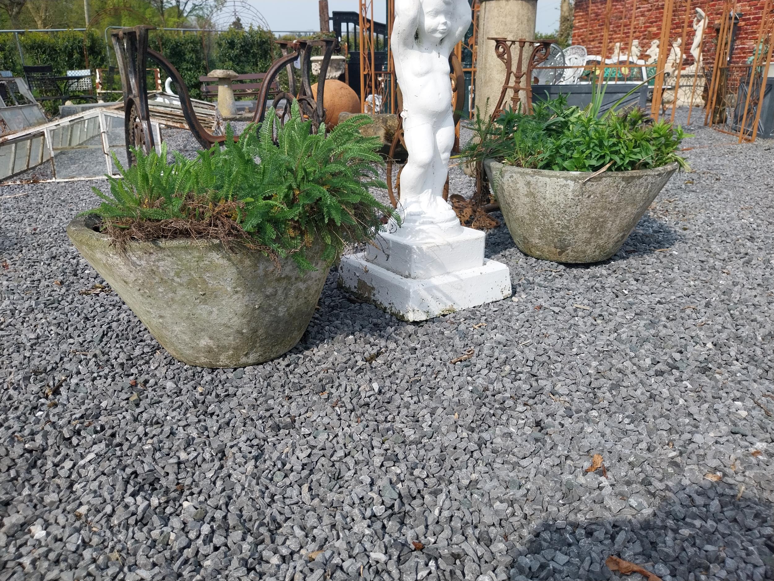 Pair of 1950s composition planters {34 cm H x 58 cm Dia.}.