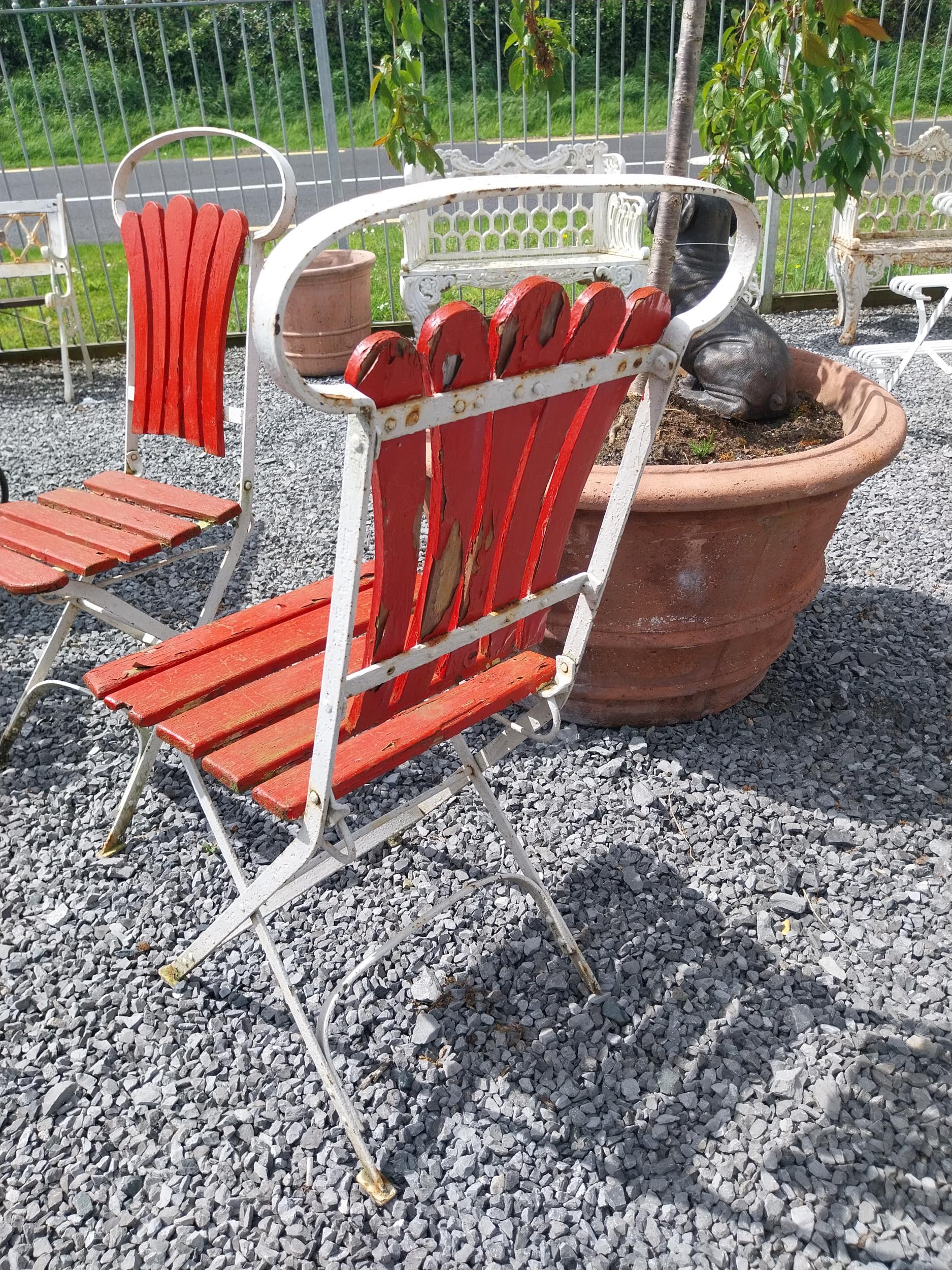 Set of four early 20th C. wrought iron folding garden chairs with wooden slats {90 cm H x 44 cm W - Image 3 of 3