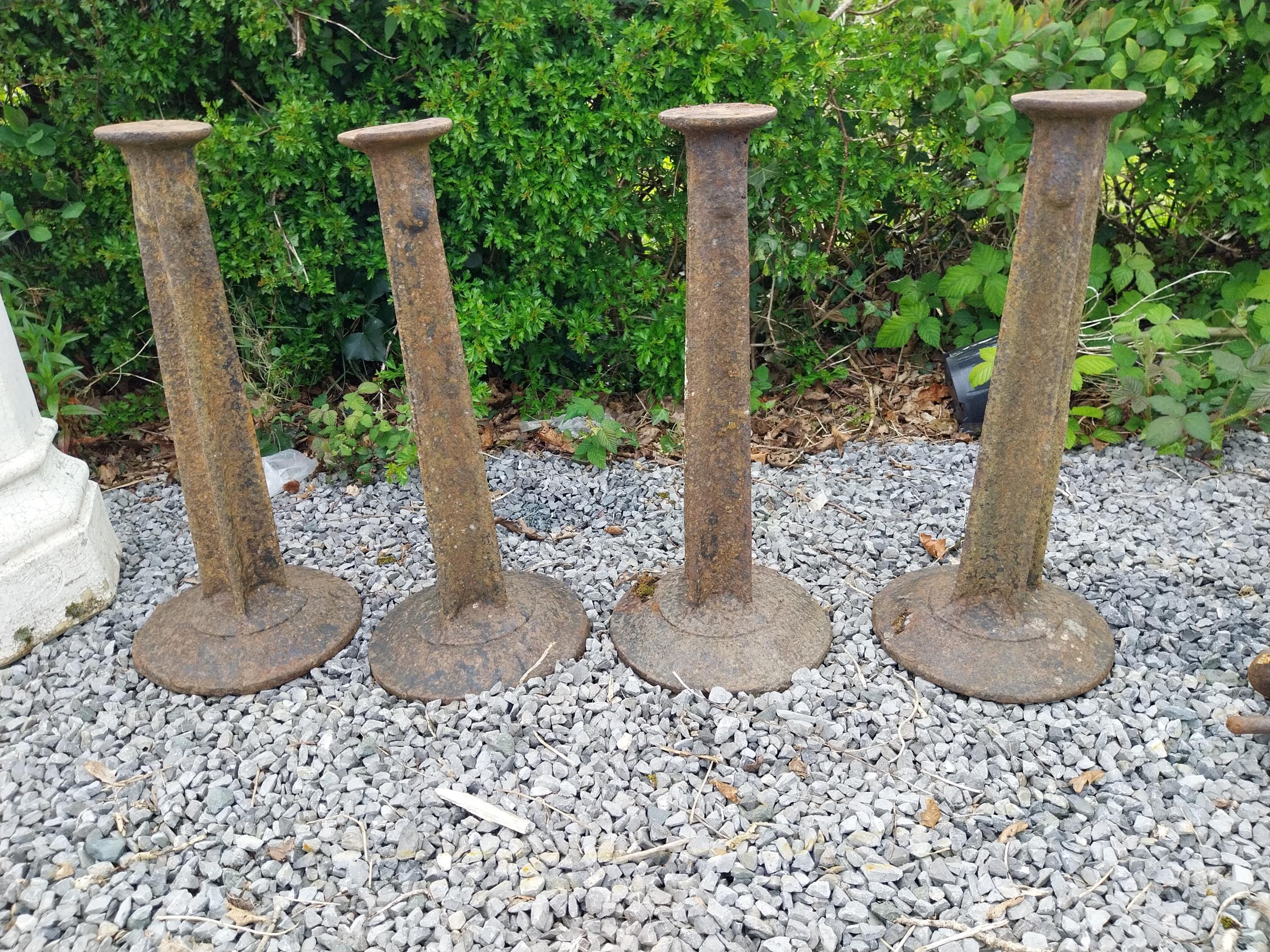 Set of four cast iron bollards {61 cm H x 28 cm Dia.}.