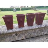 Set of four small cast iron garden planters {20 cm H x 13 cm W x 13 cm D}.