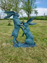 Exceptional quality bronze sculpture of Hares at play {76 cm H x 75 cm W x 33 cm D}.