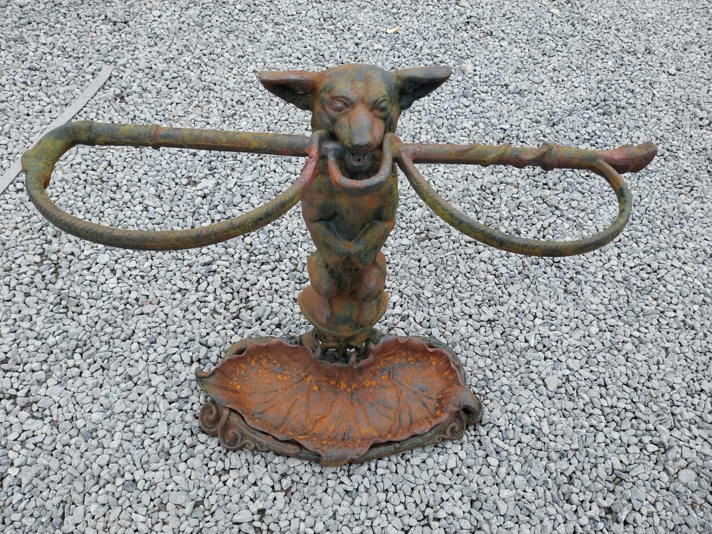 Cast iron stick stand depicting a dog in the Coalbrookdale style {58 cm H x 60 cm W x 20 cm D}. - Image 5 of 6