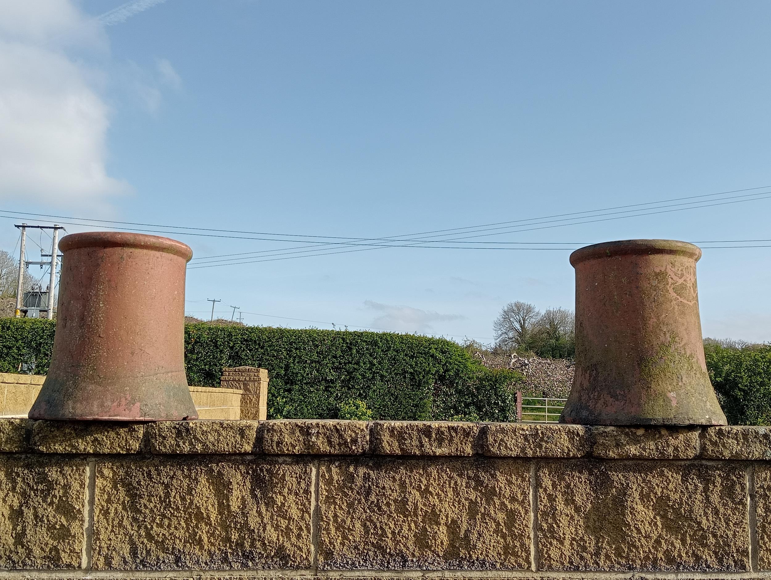 Pair of round terracotta chimney pots {H 38cm x Dia 30cm }. (NOT AVAILABLE TO VIEW IN PERSON)